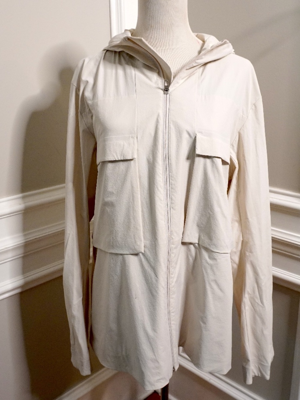 Lululemon Stretch Cargo Full Zip Jacket in a cream color.
